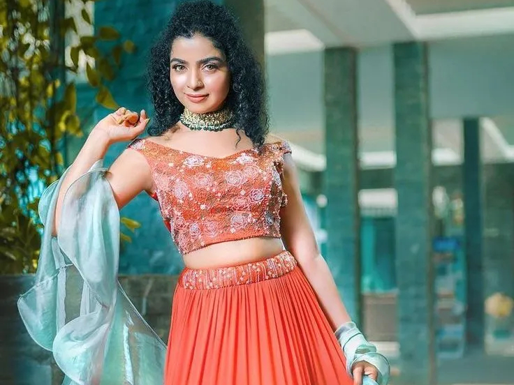 Peplum Top with High-Waisted Orange Skirt