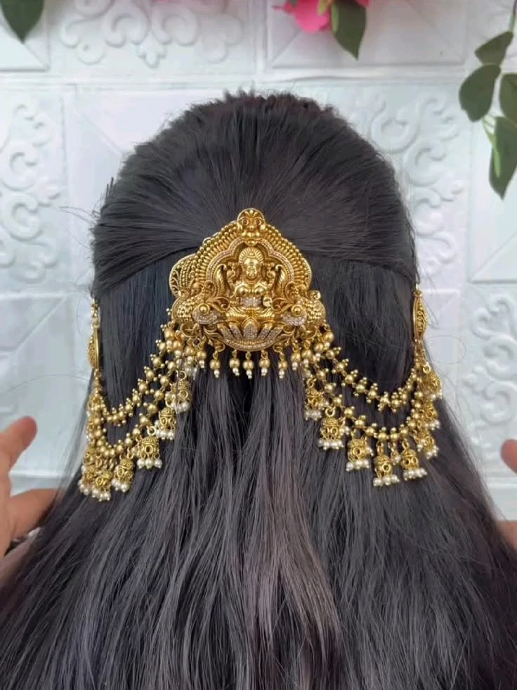 gold hair pins styled on bridal ponytail