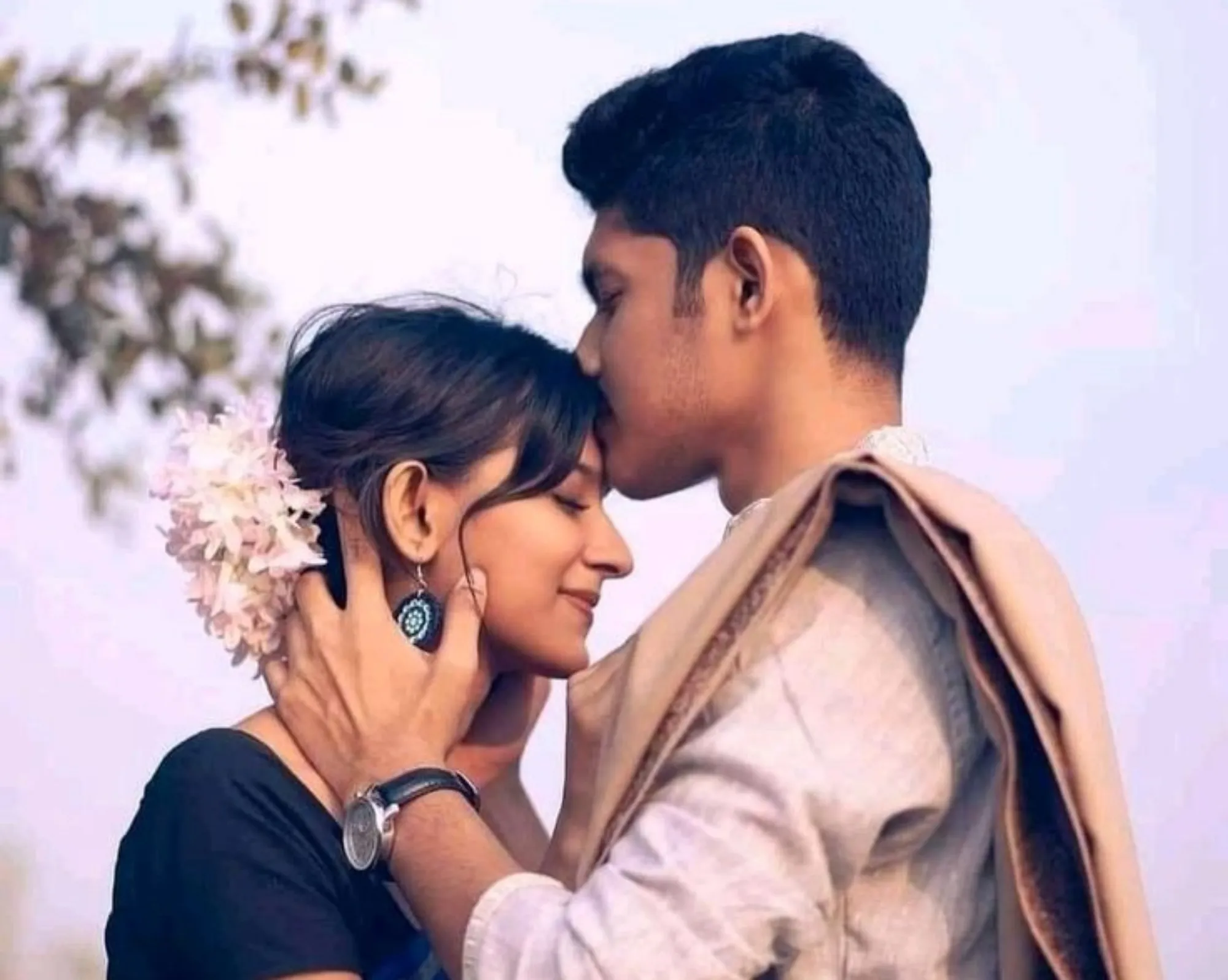 The Romantic Forehead Kiss