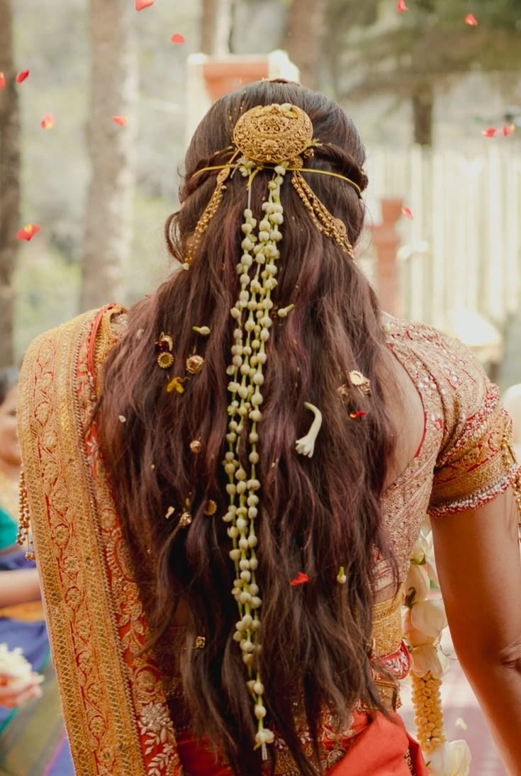 hair pin gold jewellery on bridal tie-up hairstyle