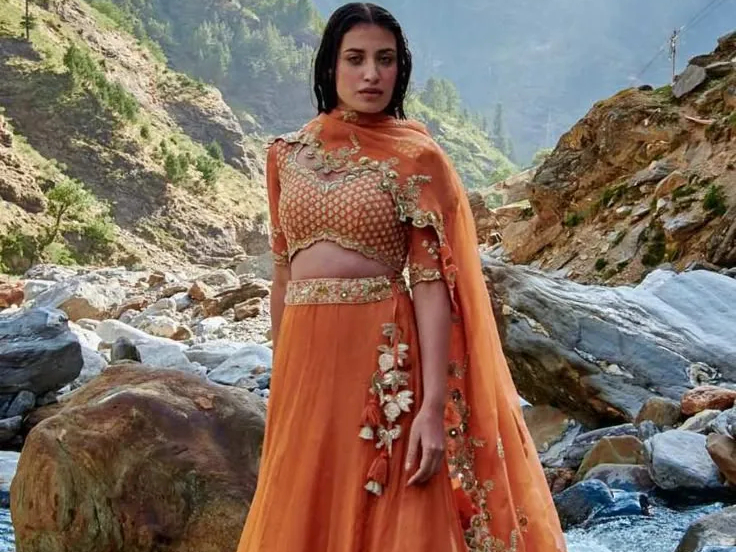 Soft Orange Lehenga in Subtle Silver Accents