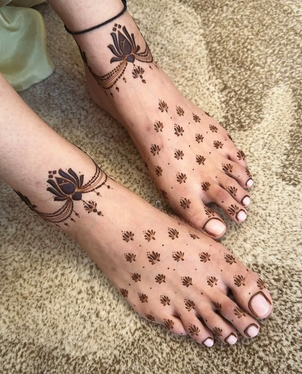 Small symbols feet Mehendi Design