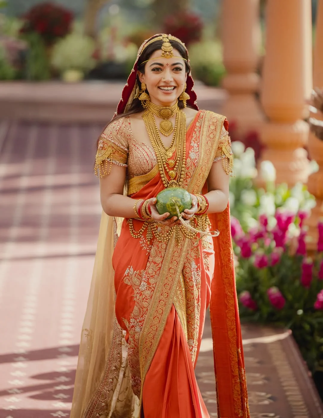 Bride in orange saree ritual